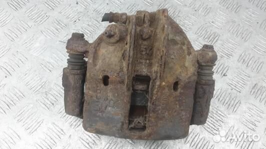 Суппорт тормозной передний правый mitsubishi caris