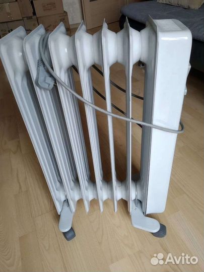 Напольный масленный радиатор