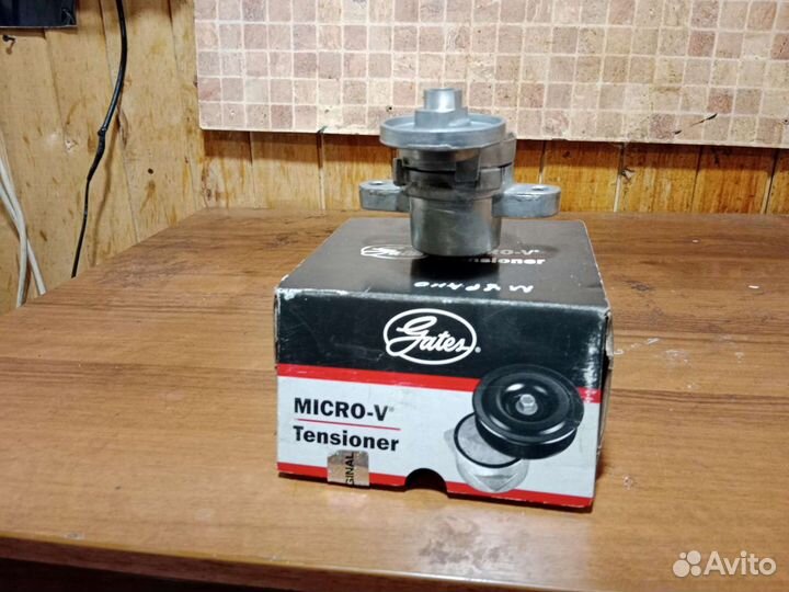 Ролик натяжителя ремня переводного Ниссан