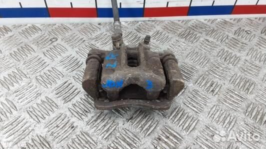 Суппорт тормозной задний правый toyota corolla E12