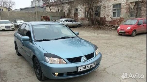 Заднее стекло на Mitsubishi Lancer 9 Замена