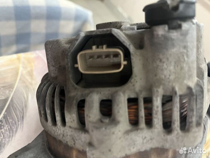 Генератор на mitsubishi lancer 10