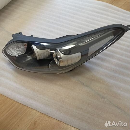 Фара передняя левая KIA sportage 4