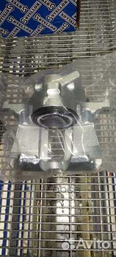 05-90710-SX суппорт тормозной передний правый