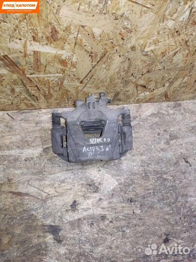 Суппорт тормозной передний левый Opel Astra J