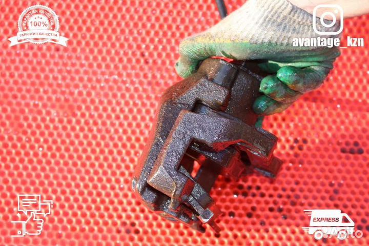 Суппорт тормозной передний правый Opel Astra H