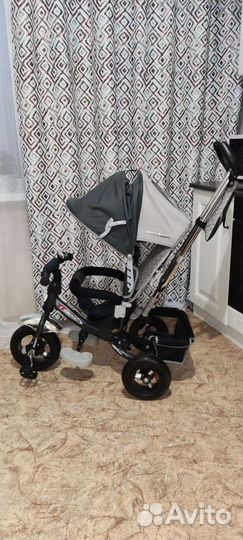 Трехколесный велосипед с родительской ручкой