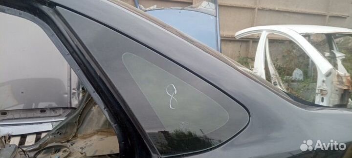 Стекло кузовное глухое заднее левое Ford Focus 2