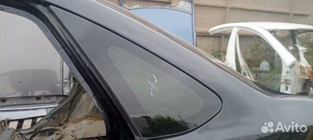 Стекло кузовное глухое заднее левое Ford Focus 2