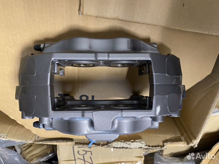 Суппорт тормозной передний левый