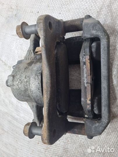 Суппорт тормозной передний правый Тойота Королла