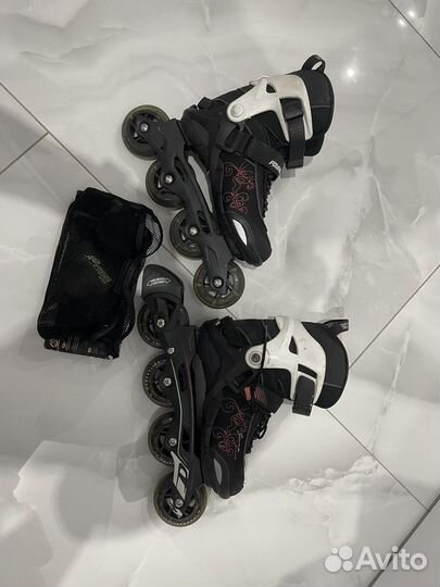 Роликовые коньки