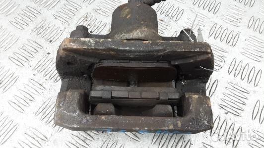 Суппорт тормозной задний левый mazda CX-7 1 (DPH09