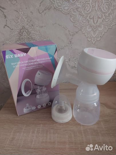 Молокоотсос электрический новый