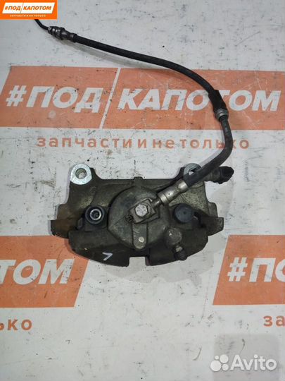 Суппорт тормозной передний левый Volkswagen Eos