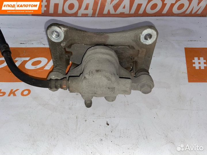 Суппорт тормозной задний левый Mitsubishi Lancer