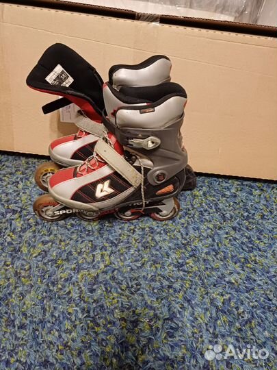 Роликовые коньки