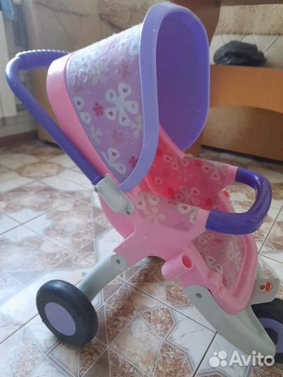 Игрушечная коляска для кукол