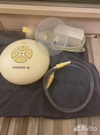 Молокоотсос medela электрический