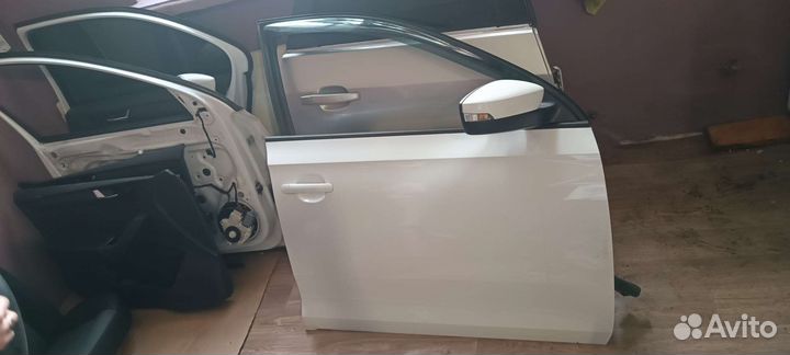Двери на skoda rapid