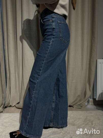 Джинсы женские с высокой талией раслешенные