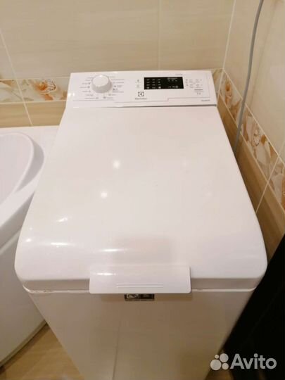 Стиральная машина с вертикальной загрузкой