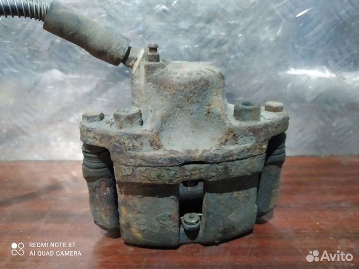 Суппорт тормозной передний левый Renault Fluence