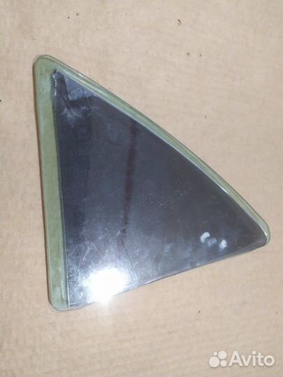 Стекло двери (форточка) левое Toyota Corolla