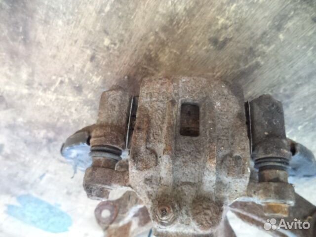 Суппорт задний правый Hyundai Tucson 2 LM