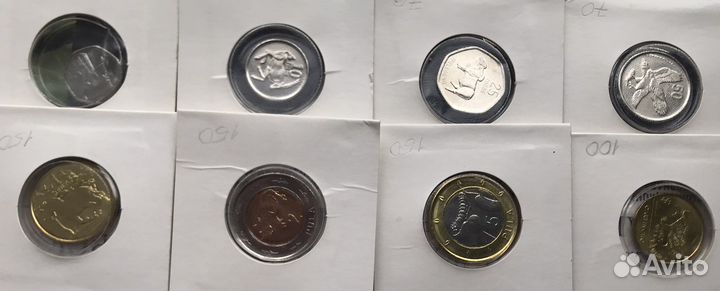 Монеты разных стран, в буклетах