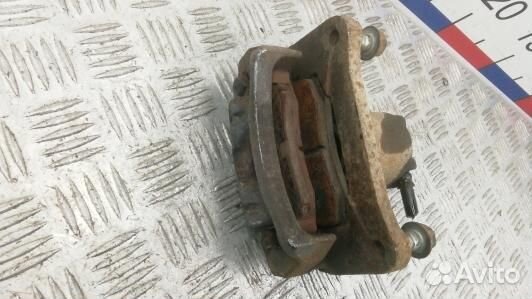 Суппорт тормозной задний левый mitsubishi pajero 4