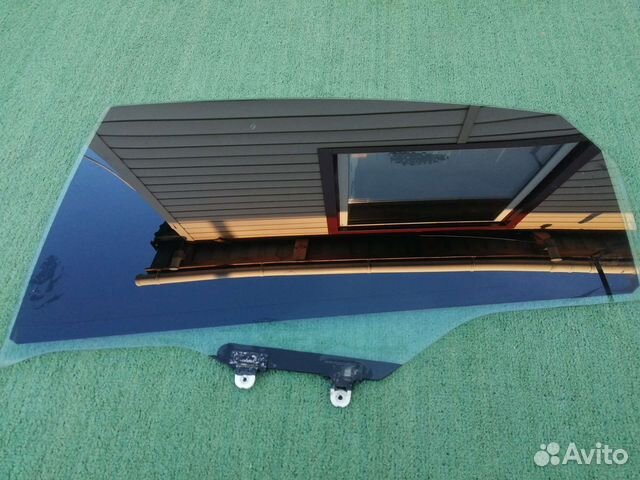 Стекло двери задней левой Nissan Almera G15