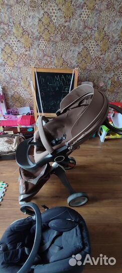 Коляска stokke