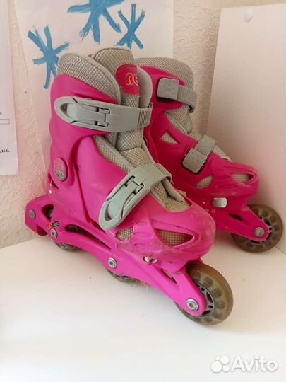 Роликовые коньки