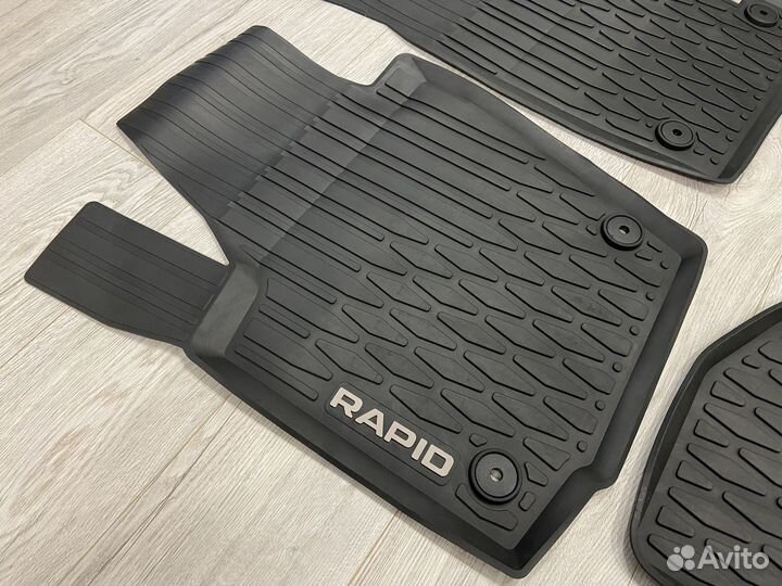 Оригинальные резиновые ковры Skoda Rapid