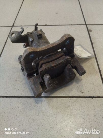 Суппорт тормозной задний правый Renault Megane 3