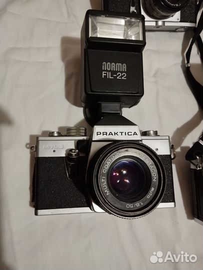 Зеркальный фотоаппарат