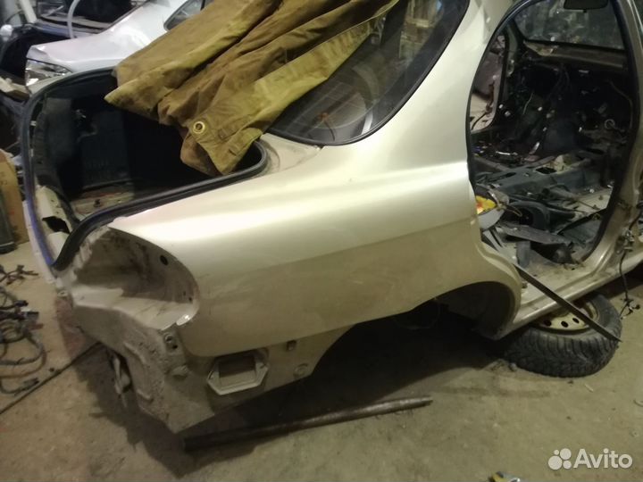 Задняя часть крыло четверть Kia Spectra