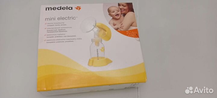Молокоотсос medela электрический