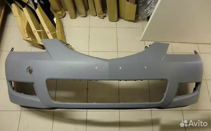 Передний бампер Мазда 3 2003-2008