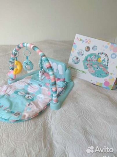 Развивающийся коврик с пианино