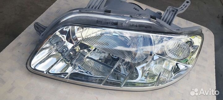 Фара передняя левая aveo T250