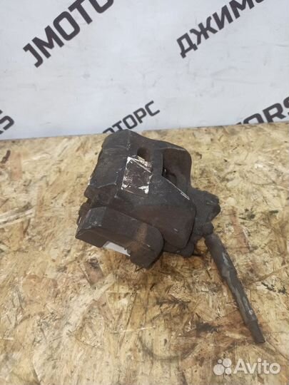 Суппорт тормозной передний левый Peugeot/Citroen