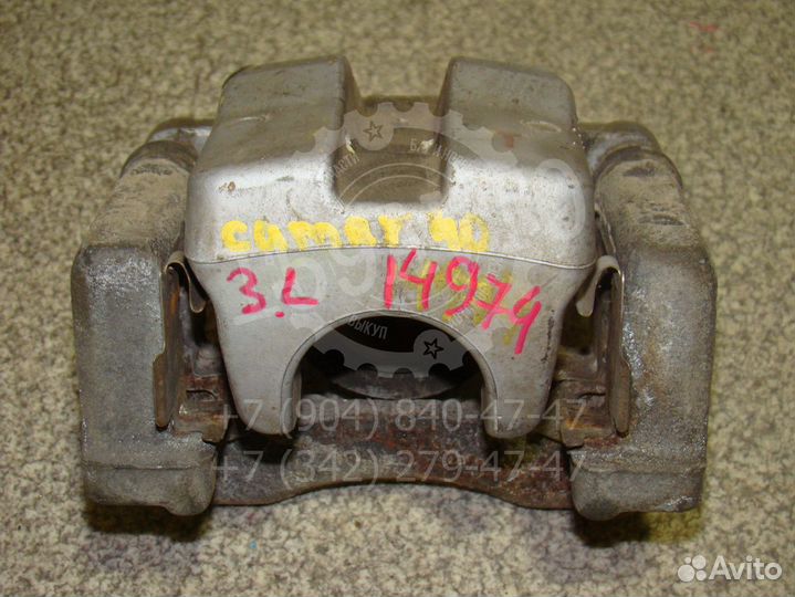 Суппорт задний правый Toyota Camry 40