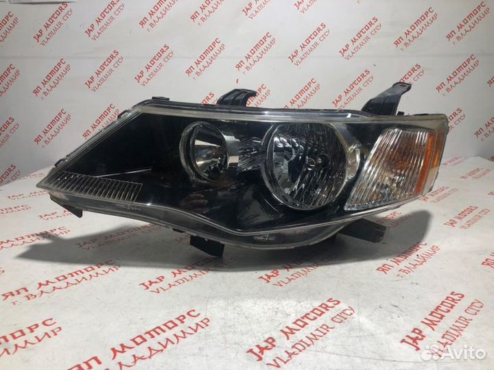 Фара галогеновая левая Mitsubishi Outlander XL