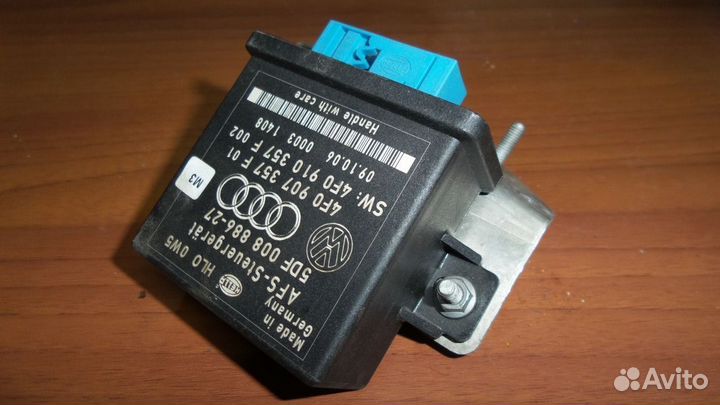 Регулировки угла наклона фар Audi Q7