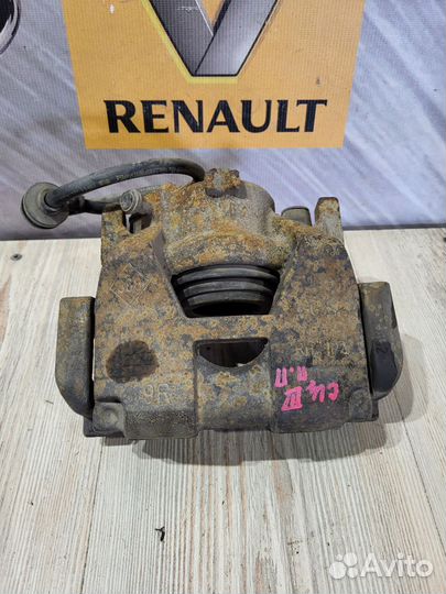 Суппорт тормозной перед Renault scenic 3 Прав