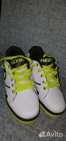 Кроссовки с роликами новые