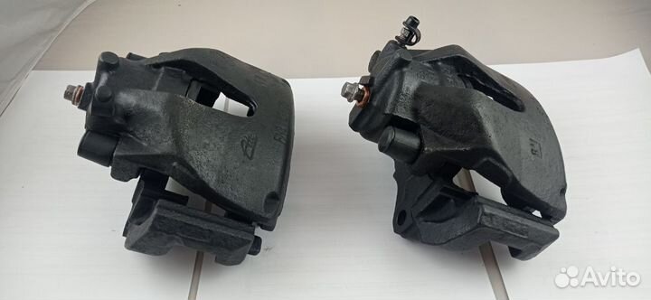 Суппорт тормозной передний opel astra G