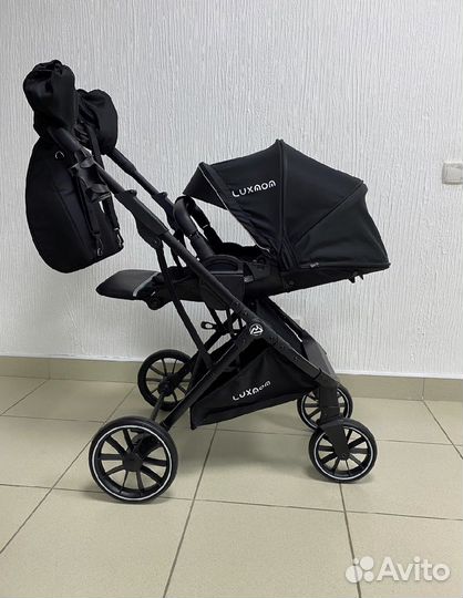 Прогулочная коляска с реверсивным блоком